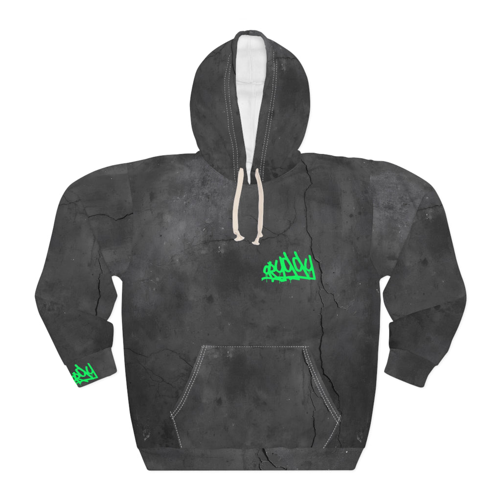 A front view of the oryggy Originals Hoodie. A premium heavyweight all-over print pullover featuring a dark charcoal grey cracked concrete texture background with subtle urban graffiti and a vibrant electric lime green "ORYGGY" graffiti tag printed on the chest.