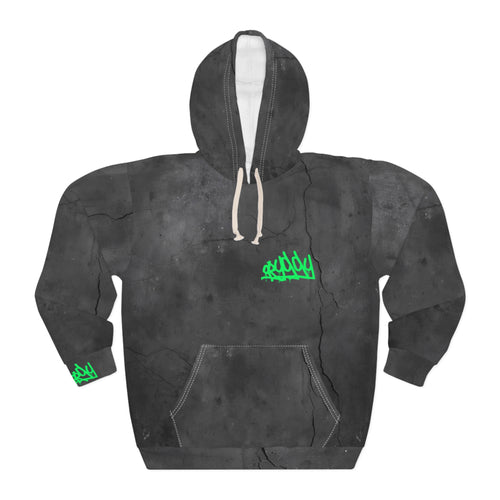 A front view of the oryggy Originals Hoodie. A premium heavyweight all-over print pullover featuring a dark charcoal grey cracked concrete texture background with subtle urban graffiti and a vibrant electric lime green "ORYGGY" graffiti tag printed on the chest.
